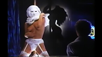 Masked Dancer Performs Provocative Moves, Followed By Intense Choking Of Restrained Man