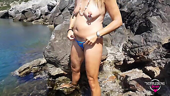 German Milf With Extreme Piercings Naked At Public Beach